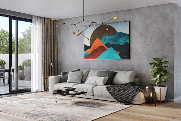Modern living room with a large abstract mountain painting.