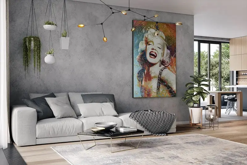 A living room setup with a large painting of a girl.