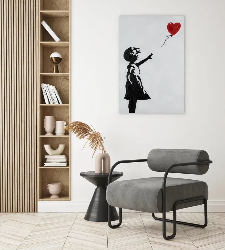 A house corner wherein there is a hung canvas of a girl holding a red balloon.