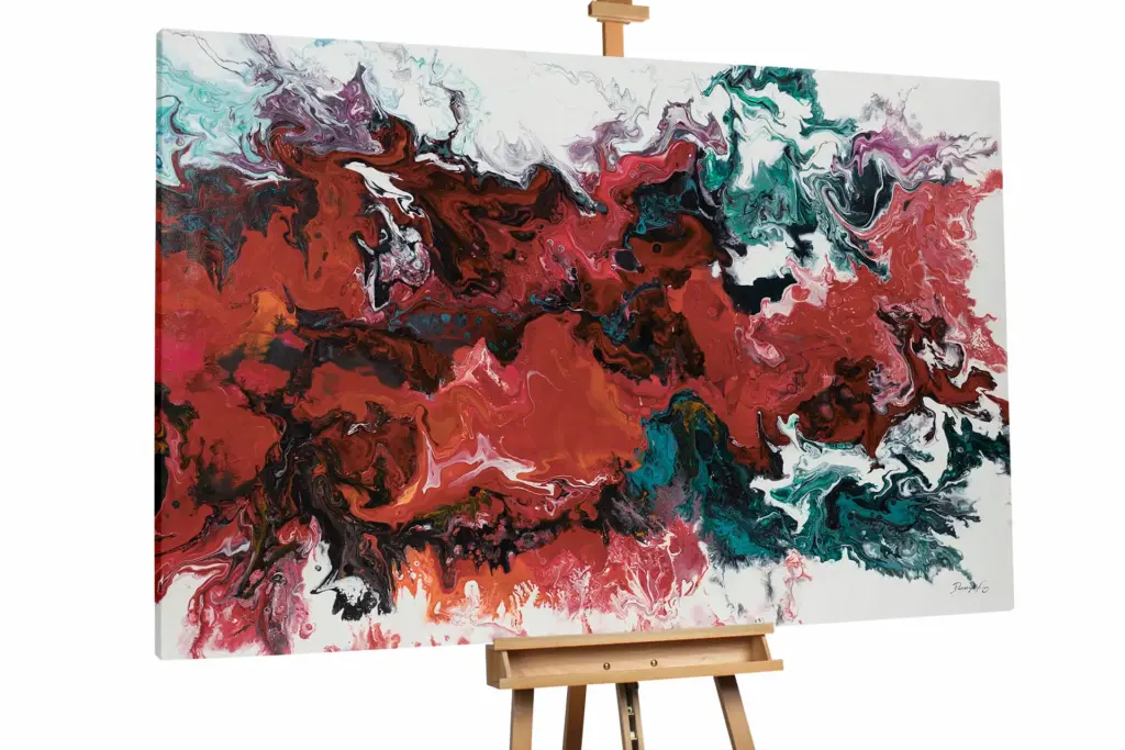 A dynamic abstract painting on an easel featuring a high-contrast mix of deep red, teal, black, and white expressive brushstrokes.